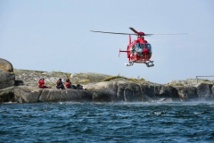 Sailor with severe knee injury being airlifted by Rescue Helicopter during the F18 Raid Worlds 2017.